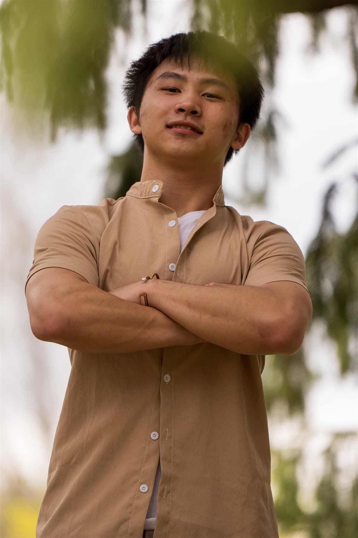 Outdoor portrait with a more editorial pose.